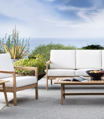 White cushion light wood finish outdoor patio living set