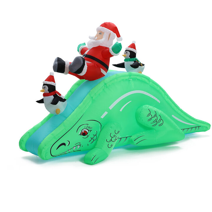 LuxenHome Santa and Penguins Trio Sliding on a Dinosaur Inflatable Holiday Decoration