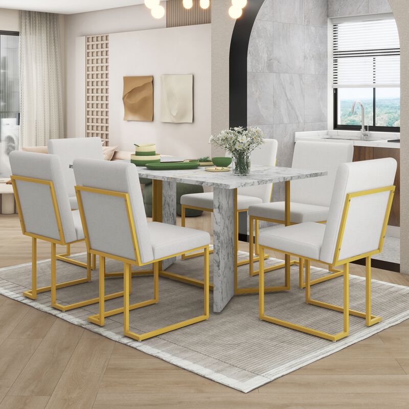 7Piece Modern Dining Table Set, Artificial Marble Sticker Tabletop and 6 Upholstered Linen Chair All with Golden Steel Legs for Dining Room and Kitchen (White + Gold)
