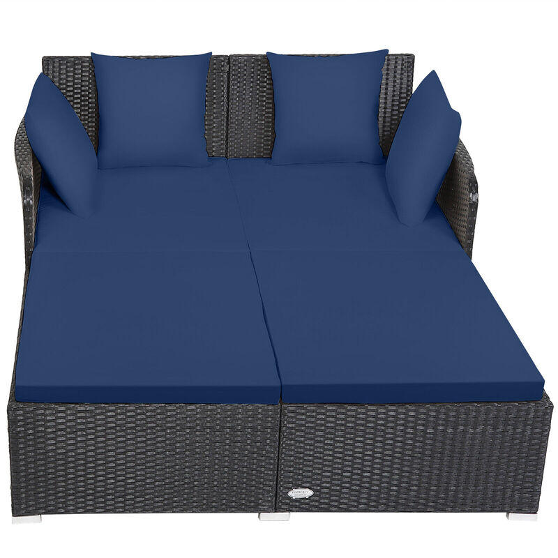 Spacious Outdoor Rattan Daybed with Upholstered Cushions and Pillows