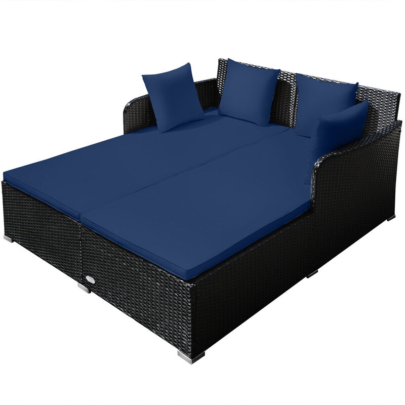 Spacious Outdoor Rattan Daybed with Upholstered Cushions and Pillows