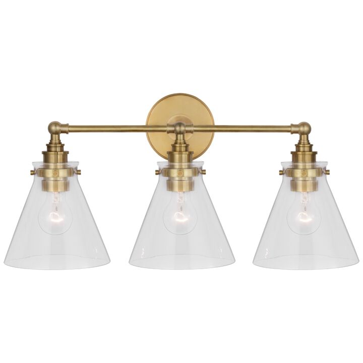 Parkington 24" Three Light Bath Bar in Antique-Burnished Brass with Clear Glass