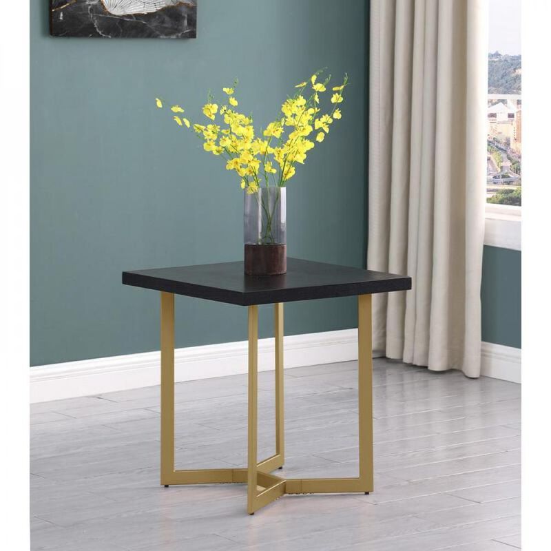 Black wood top end table w/ gold color iron legs