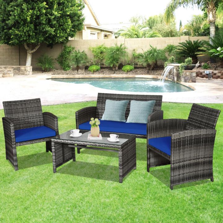 Hivvago 4 Pieces Patio Rattan Furniture Set with Glass Table and Loveseat