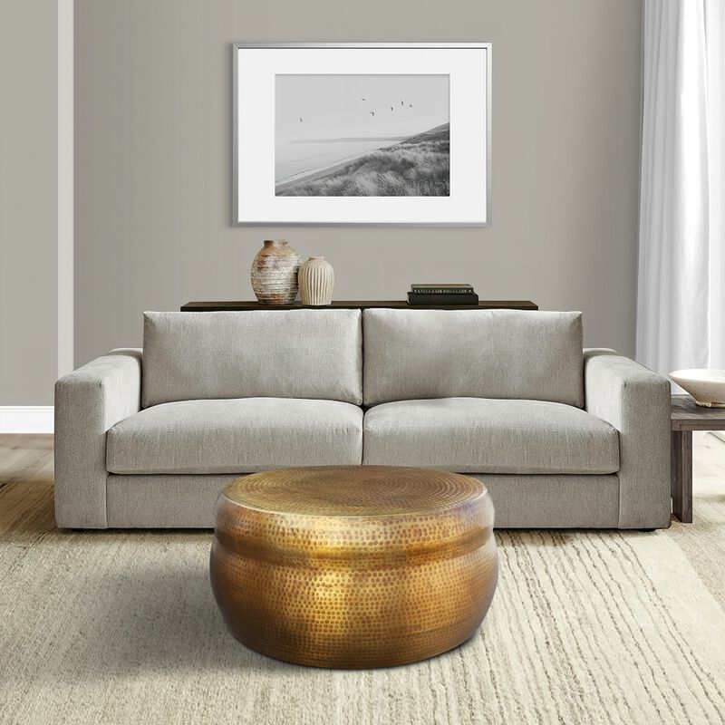 32 Inch Artisanal Round Drum Coffee Table, Hammered Embossed Texturing, Aluminum, Antique Brass-Benzara