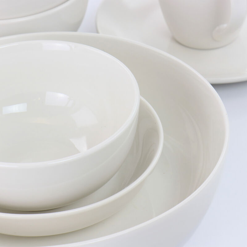 Elama Iris 32 Piece Porcelain Dinnerware Set with 2 Serving Bowls in White